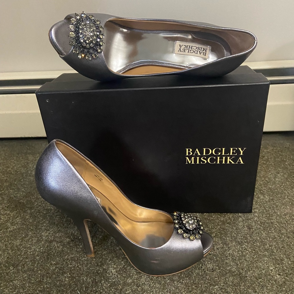 Women’s size 9M, silver bedazzled open toe Badgley Mischka heels.